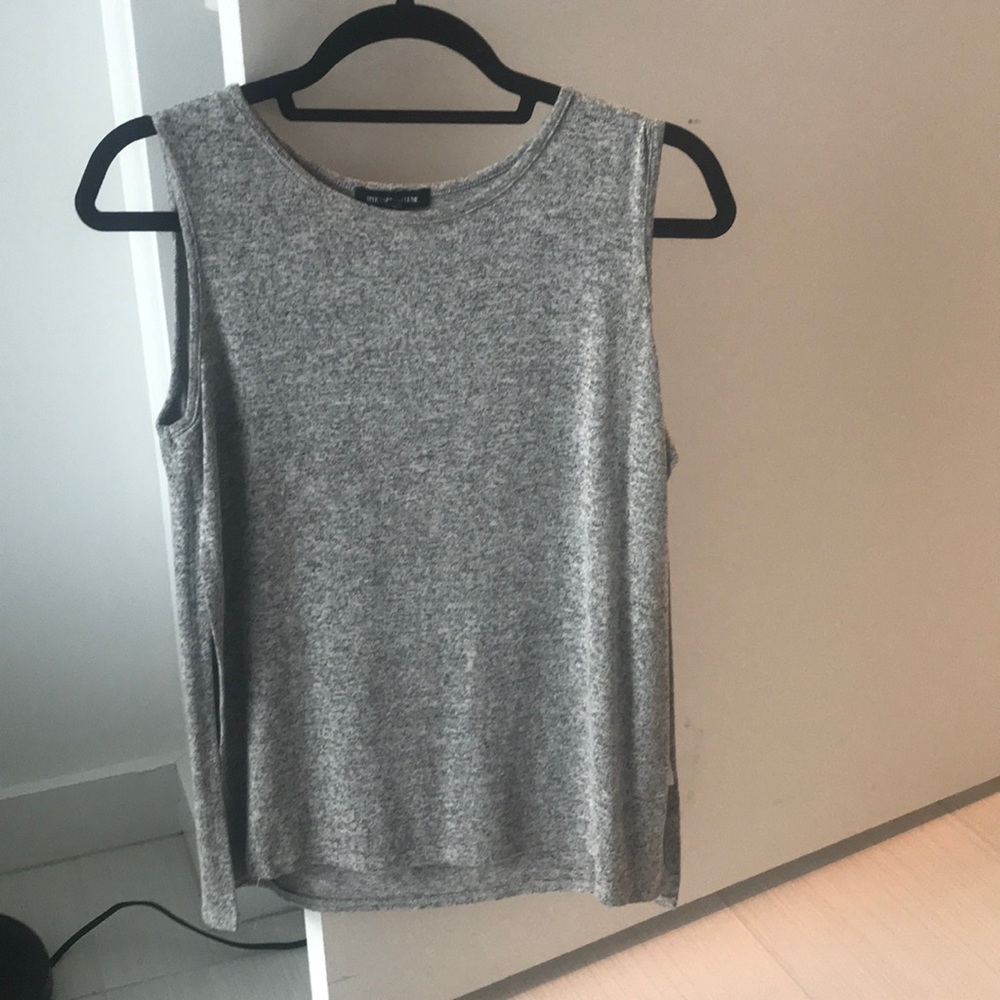 Easy throw on tank with slits in both sides!